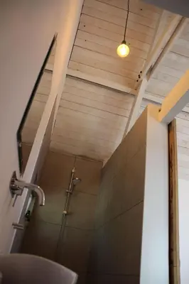 a bathroom with a shower and a sink at Belle Chique - Maastricht in Lanaken