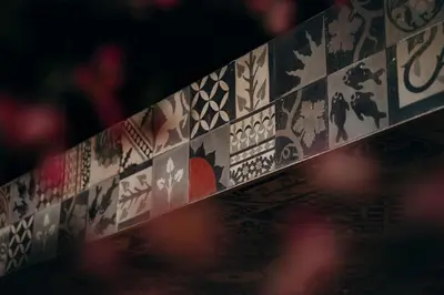 a close up of a wall with drawings on it at Carbon Hotel in Genk