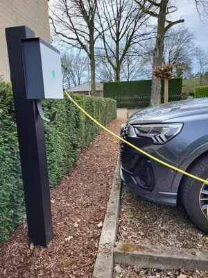 a car is hooked up to a car charger at B&B De Edelsteen in Zutendaal