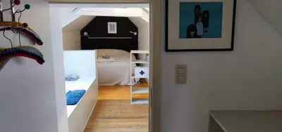 a hallway with a room with a bunk bed at Wetterdelle in Heers