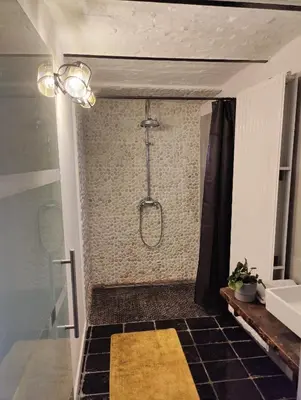 a bathroom with a shower and a sink at Wetterdelle in Heers