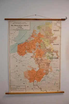 a map hanging on a wall at Villa Lumina in Membach