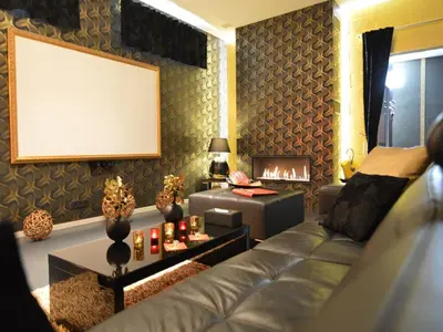a living room with a couch and a fire place at Holiday Home in Welkenraedt with Sauna in Welkenraedt