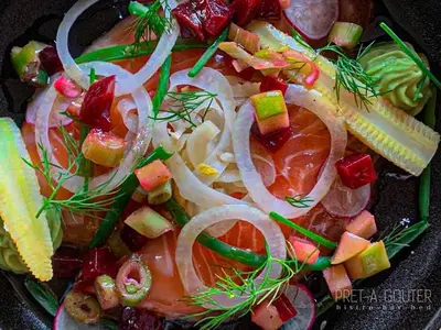 a plate of food with vegetables and onions at PRET A GOUTER bistro bar bed in Heusden - Zolder
