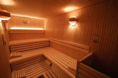 an empty sauna with a light on top of it at Hotel Restaurant Tychon AG in Eynatten
