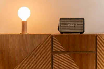 a desk with a radio and a light on it at Appartement Guillemins Station Terrace in Liège