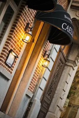 a building with a sign that reads calili on it at Boutique Hotel Caelus VII in Tongeren