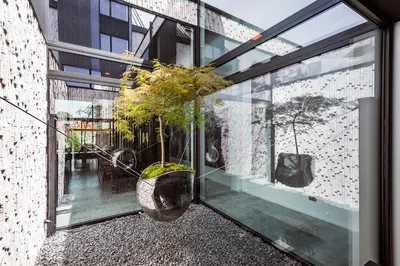 a room with a window with potted plants on it at Designhotel Beila in Bilzen