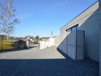 a building with a door on the side of it at Cozy Villa in Dalhem Ardennes with Private Garden in Dalhem