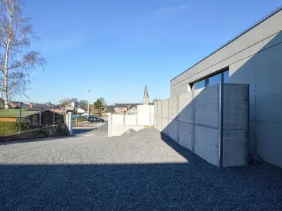 a building with a door on the side of it at Modern Dalhem Villa with Views in Dalhem