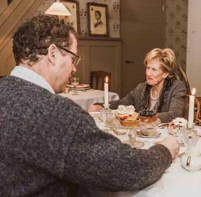 a man and a woman sitting at a table at B&B Hostellerie Marie in Eben-Emael