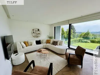 a living room with a white couch and chairs at Résidence de 3 appartements luxueux - 2 ch x 3 - 