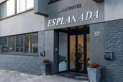 a building with a sign that reads esplanada at Esplanada Studios in Genk