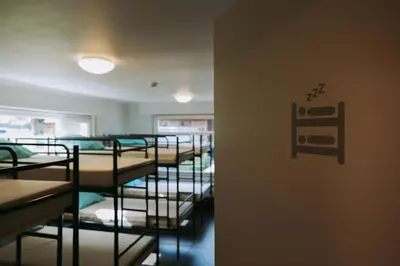 a row of bunk beds in a room at Vakantiewoning Vennekens in Peer