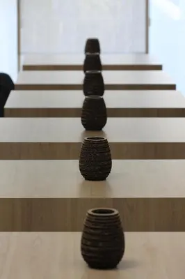 a group of black spheres sitting on a court at B&B Atuatuca in Tongeren
