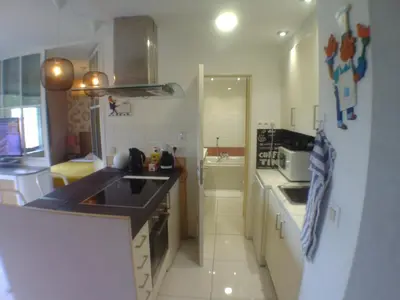 a kitchen with a sink and a counter top at Liège centre 6 rue montagne sainte Walburge, 4000 Liège, pour 2 pers à 3 minutes de la gare st Lambert in Liège