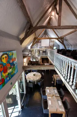 an overhead view of a restaurant with tables and chairs at de Bosch in Lummen