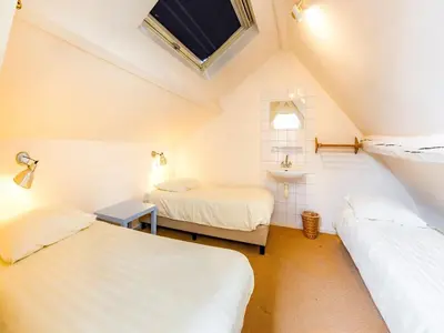 a room with two beds and a sink at De Appelgaard Voeren Estate in Berg