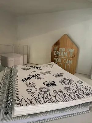 a bed with a comforter that says if you can dream if you can at Chalet Happiness in Zutendaal