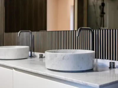two sinks on a counter in a bathroom at Ons Huis in Hechtel-Eksel