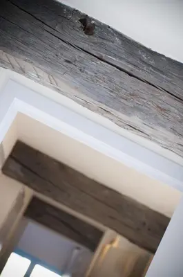 a close up of a wooden beam on a ceiling at Apartment De Maasnacht in Maaseik