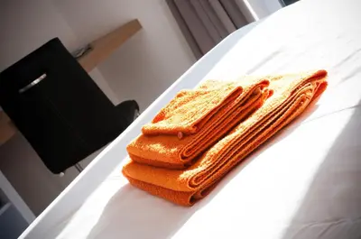 two slices of bread sitting on a table at Apartment De Maasnacht in Maaseik