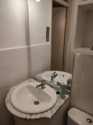 a bathroom with a sink and a toilet at Your Stay in Kelmis - La Calamine- Cosy apartment in the Ardennes -Three-country point - Neu-Moresnet in Kelmis