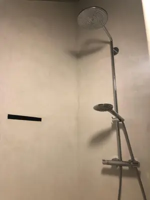 a shower with a shower head in a bathroom at Factorij10 in Peer