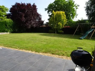 a view of a yard with a playground at Heers Retreat with Sauna in Heers
