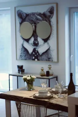 a table with a picture of a bear wearing sunglasses at Casa Honey in Liège