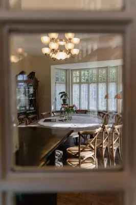 a dining room with a table and chairs at Villa les Bruyères in Dilsen-Stokkem