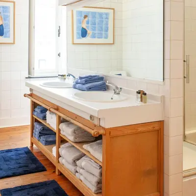 a bathroom with a sink and a mirror at Villa Asch in As