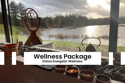 a view of a lake with a wellness package with a sculpture at BnB Pastel -B&B Breakfast Included- in Dilsen-Stokkem