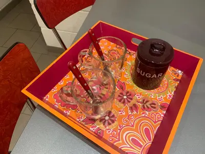 a tray with two glasses on top of a table at Le Pavillon de Flore by Maison Brasseurs d'Etoiles - Appartement 2 personnes in Liège