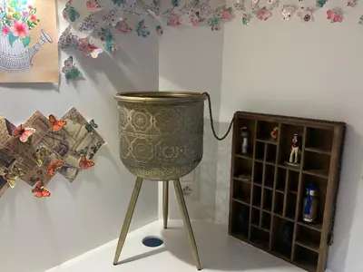 a metal bucket on a stand next to a shelf at Le Pavillon de Flore by Maison Brasseurs d'Etoiles - Appartement 2 personnes in Liège