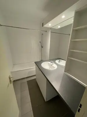 a bathroom with a sink and a mirror at Alexis's loft in Liège