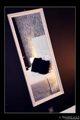 a picture of a bed with a mirror on it at V E R O N E - Rooms & Suites - Liège - Rocourt in Liège