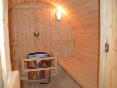 a room with a sauna with a stove in it at Verviers Villa with Sauna in Verviers