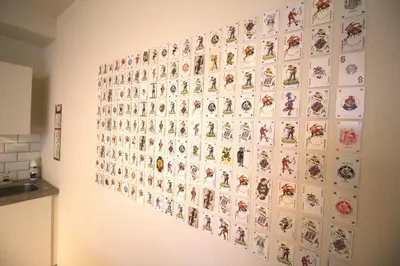 a wall with a bunch of stickers on it at Bel appartement 2 chambres avec terrasse in Liège