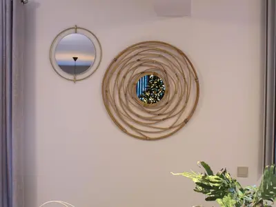 a circular mirror on a wall with a wall at Retreat near Maasmechelen in Lanaken